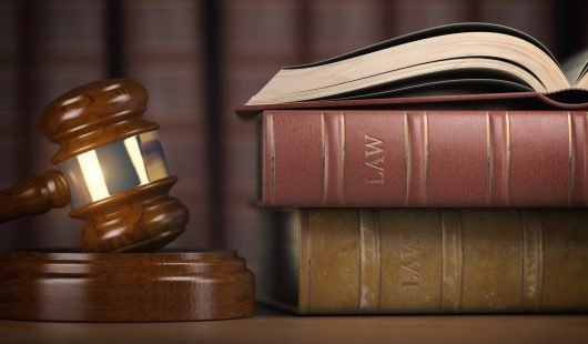 Justice, law and legal concept. Judge gavel and law books.